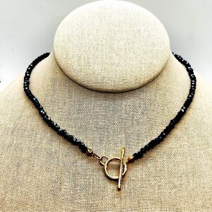NWOT Beautiful beaded black necklace with toggle clasp, stainless steel closure